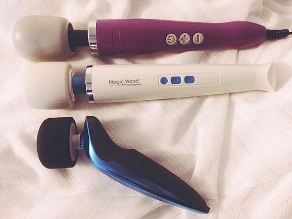 comparison photo of Doxy, Hitachi magic wand rechargeable, and tantus rumble size