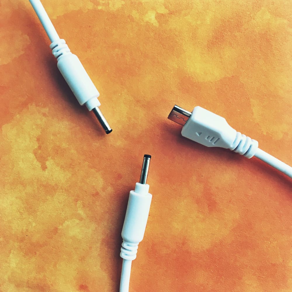 Comparison photo showing charging cord connections